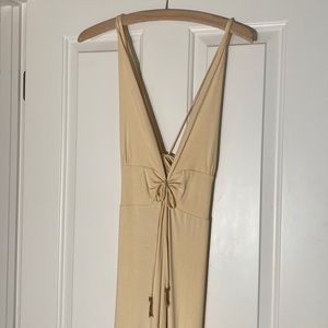 This dress is never been worn absolutely beautiful bought it in Costa Rica.